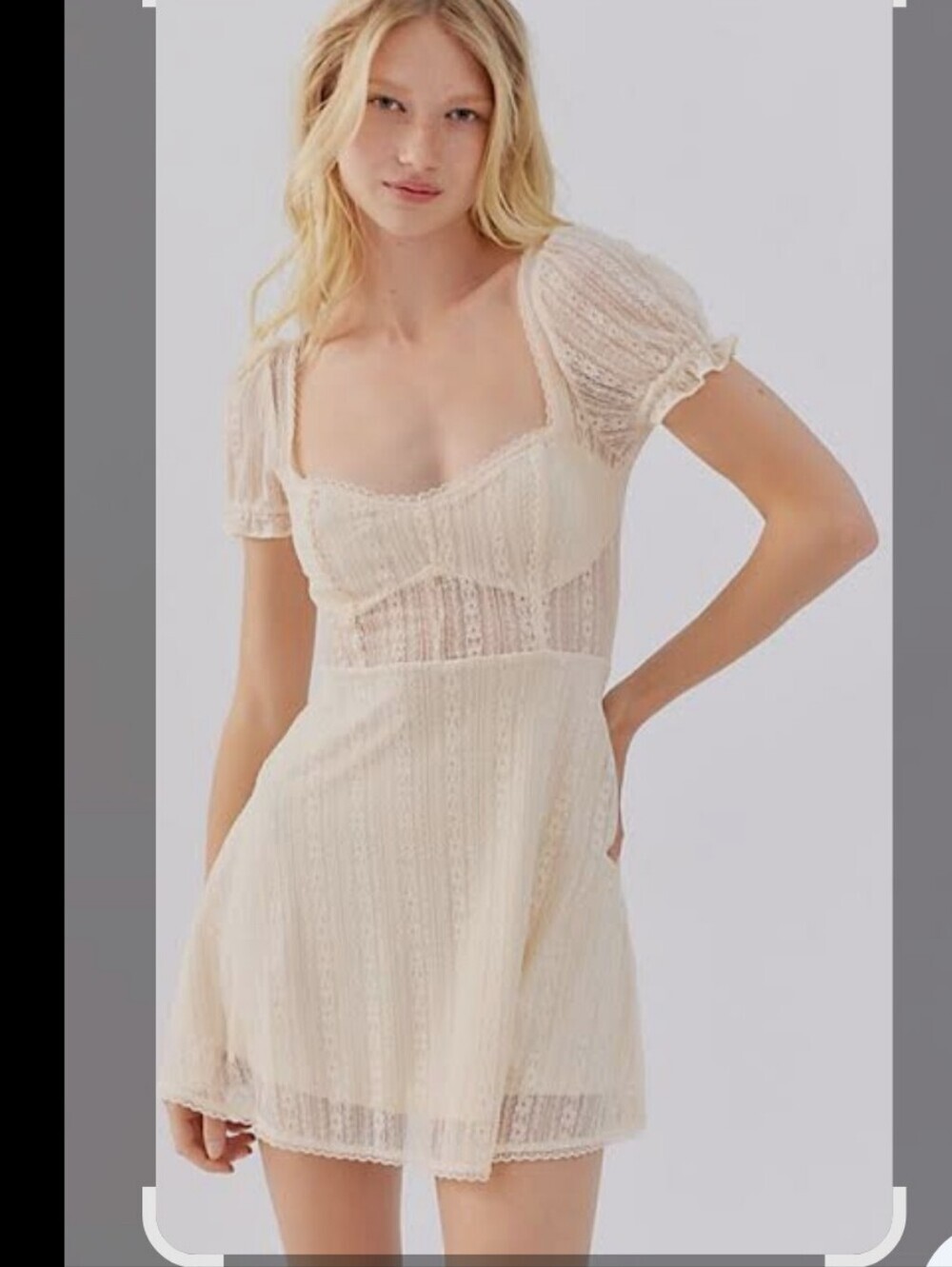 Urban outfitters roxie lace mini dressbow tie detail in the back Sz Large Cream